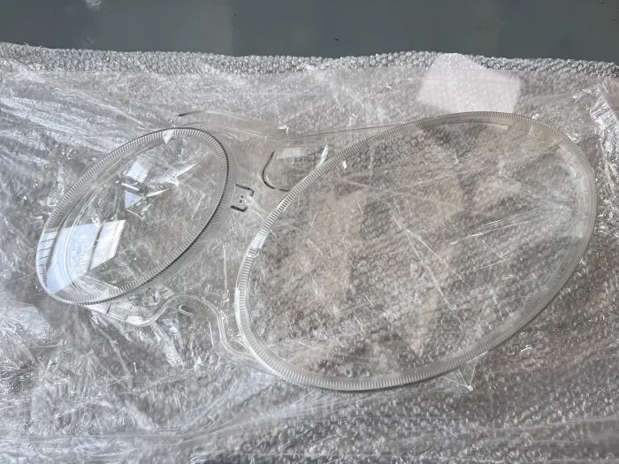 2118201561# Headlight Lens for 