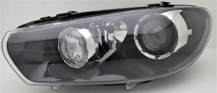 1K8941753B Headlight for VW SCIROCCO III (137, 138)