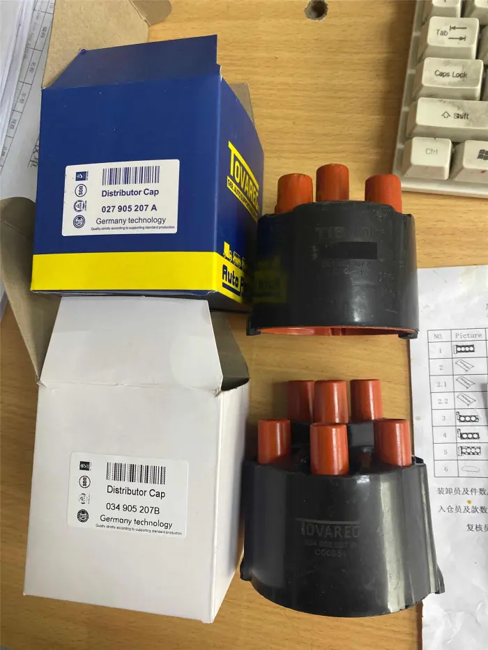 027905207A Крышка распределителя для AUDI 80, BMW 3 Series, VW PASSAT, SEAT IBIZA II (6K1), IBIZA Mk II (6K1), TRABANT 1.1 Universal, WARTBURG 353 Break, 353 Tourist